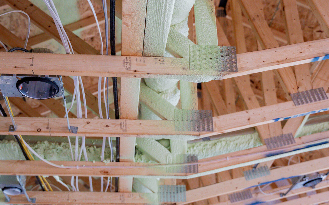 ceiling or attic structure showing wooden framing and electrical wiring